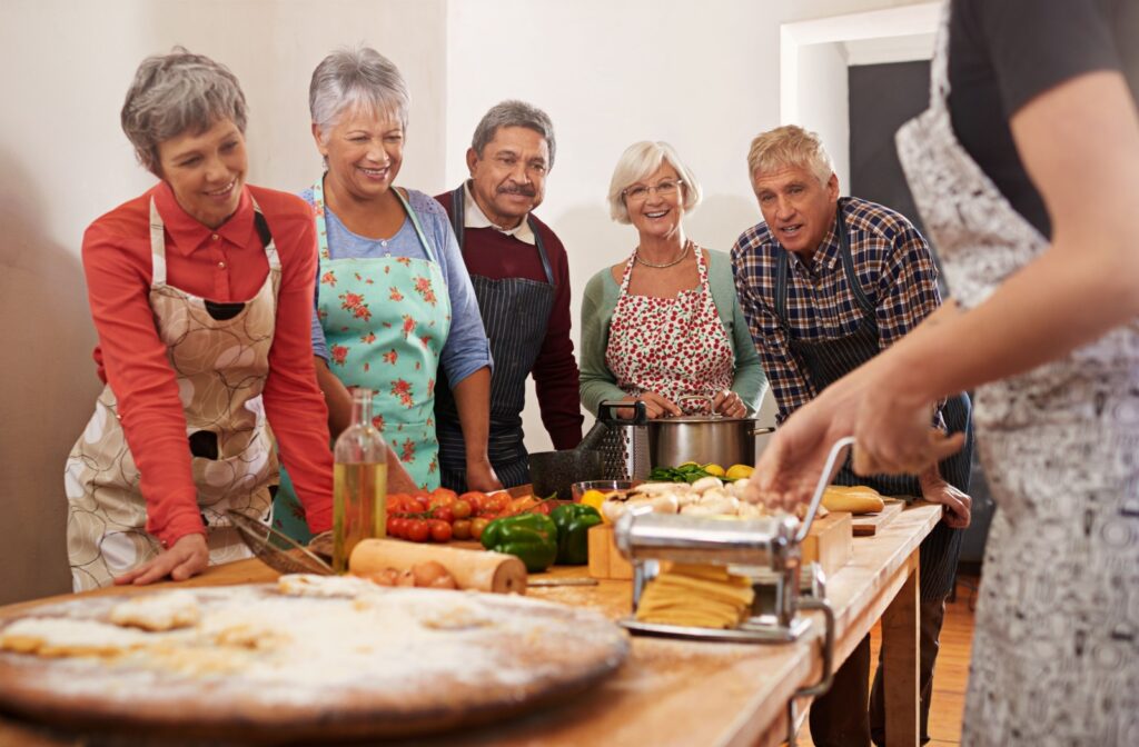 A group of seniors attend a cooking class together.